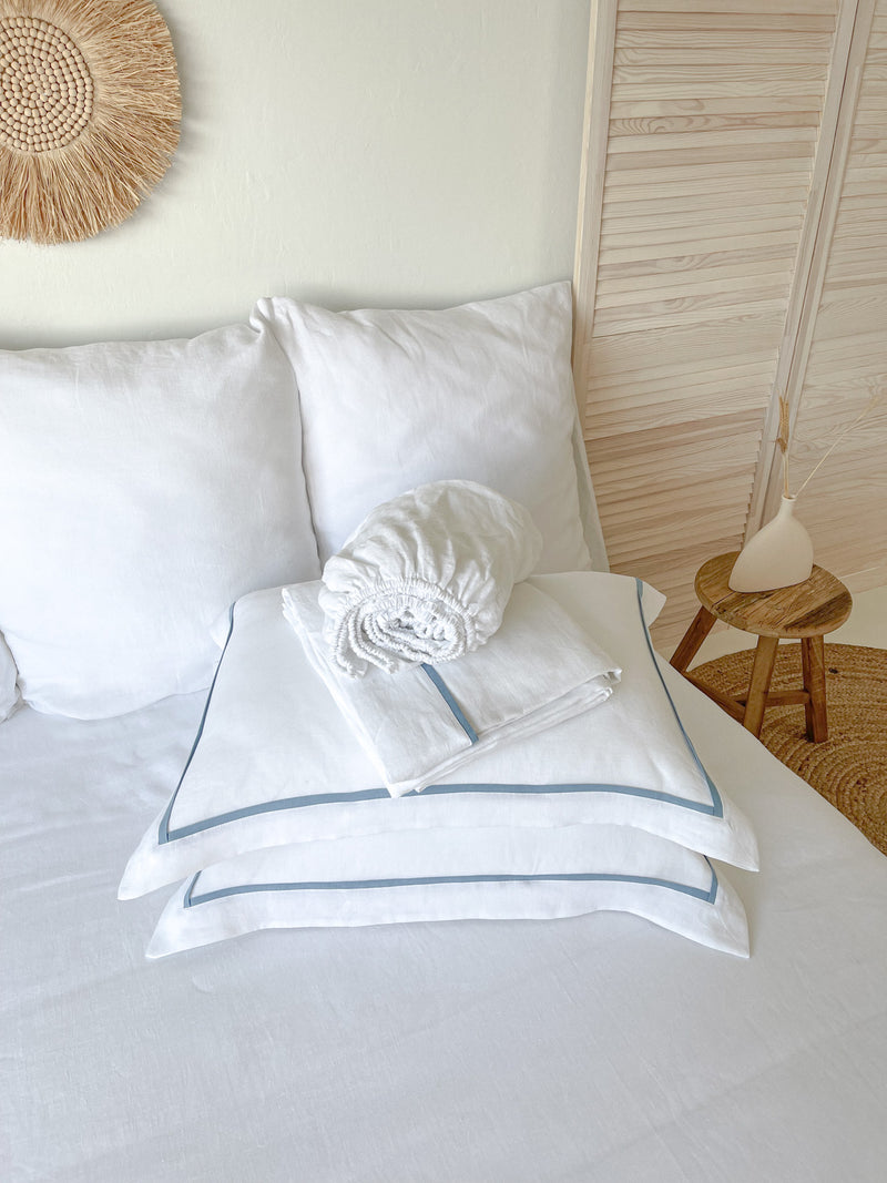 White Linen Sheet set with Pillow Shams and Light Blue Trim